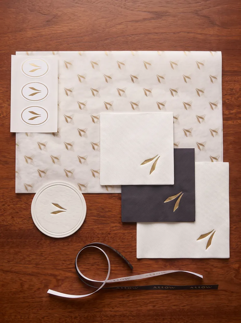 Branded tissue, napkins, coaster and ribbon in one matching set